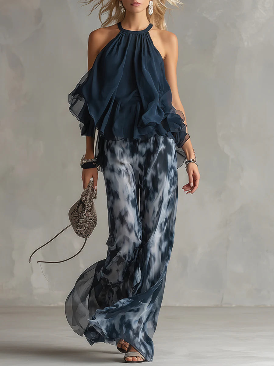 Top con Collo Halter Blu Navy e Pantaloni a Gamba Larga Stampati in Chiffon