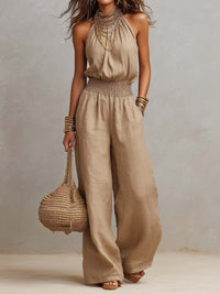 Jumpsuit khaki con scollo all'americana e vita alta