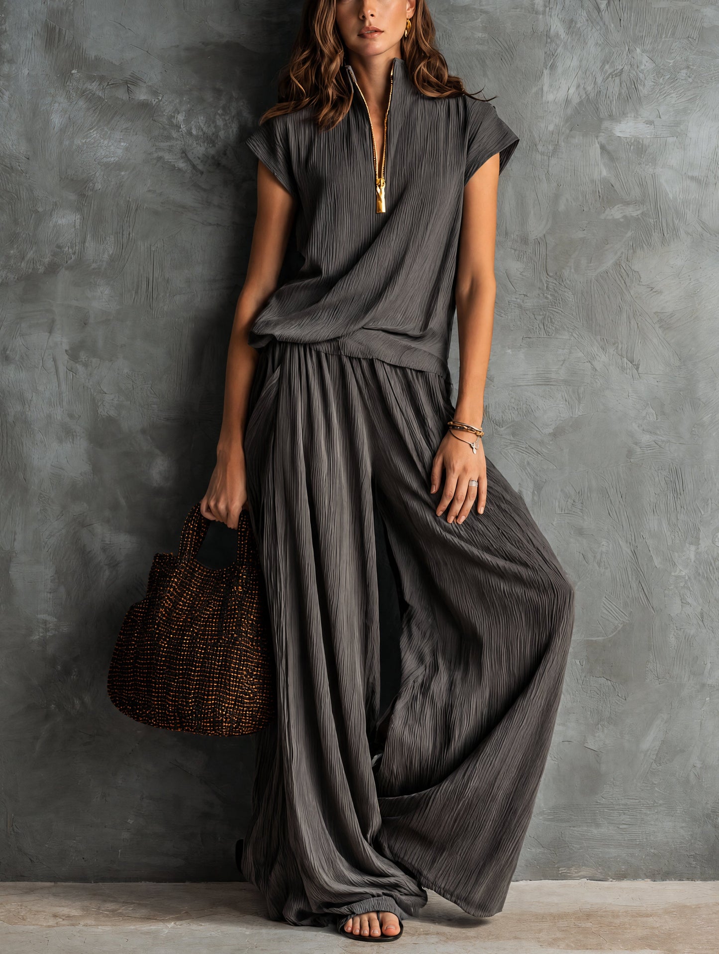 Set di top e pantaloni grigi casual con zip