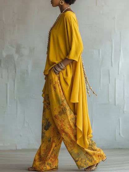 Set Top Asimmetrico Giallo e Pantaloni a Gamba Larga con Fantasia