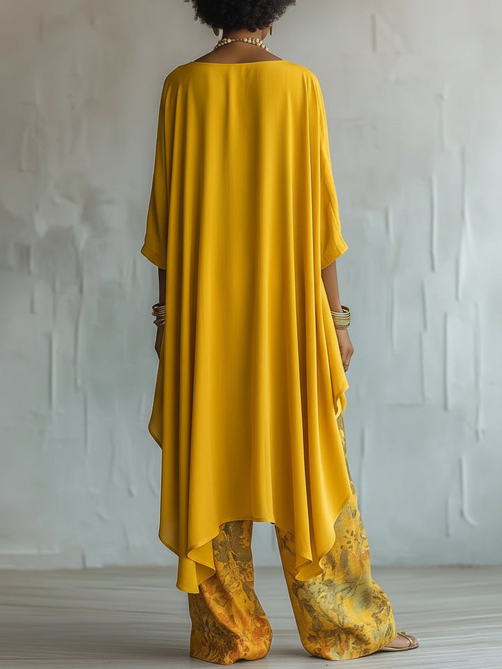 Set Top Asimmetrico Giallo e Pantaloni a Gamba Larga con Fantasia