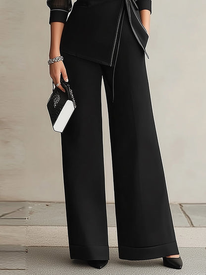 Completo Blazer Nero con Maniche in Rete Trasparente e Pantaloni a Gamba Larga