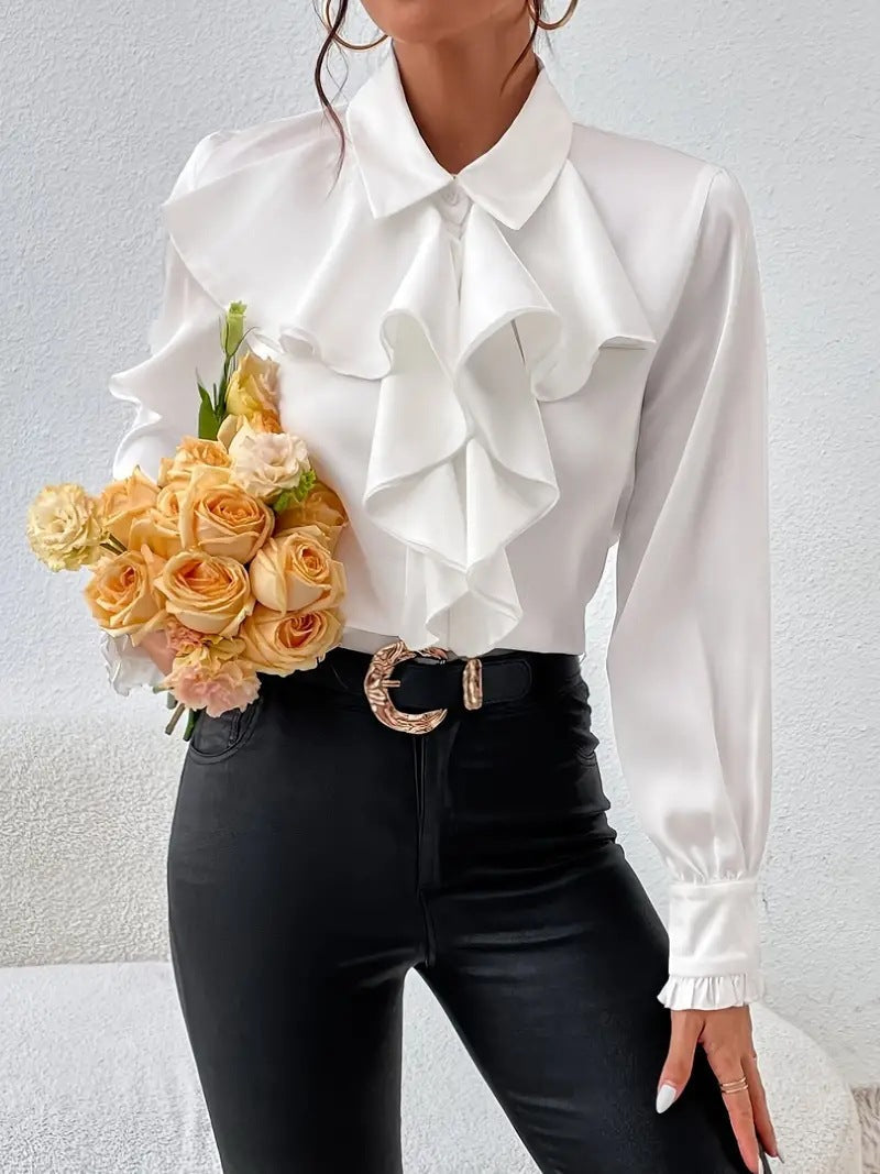 Camicia elegante con dettagli di design arricciati e a strati.