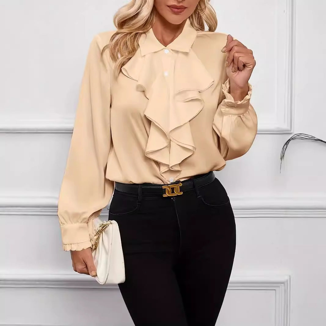 Camicia elegante con dettagli di design arricciati e a strati.