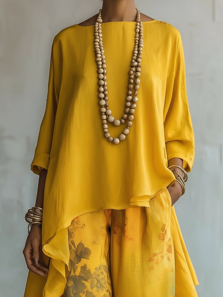 Set Top Asimmetrico Giallo e Pantaloni a Gamba Larga con Fantasia