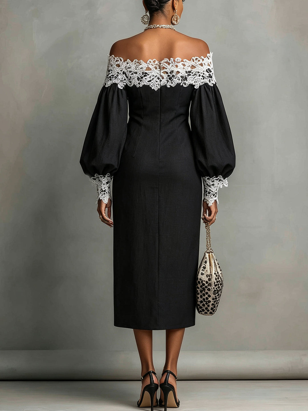 Abito midi nero off-the-shoulder con rifiniture in pizzo a contrasto
