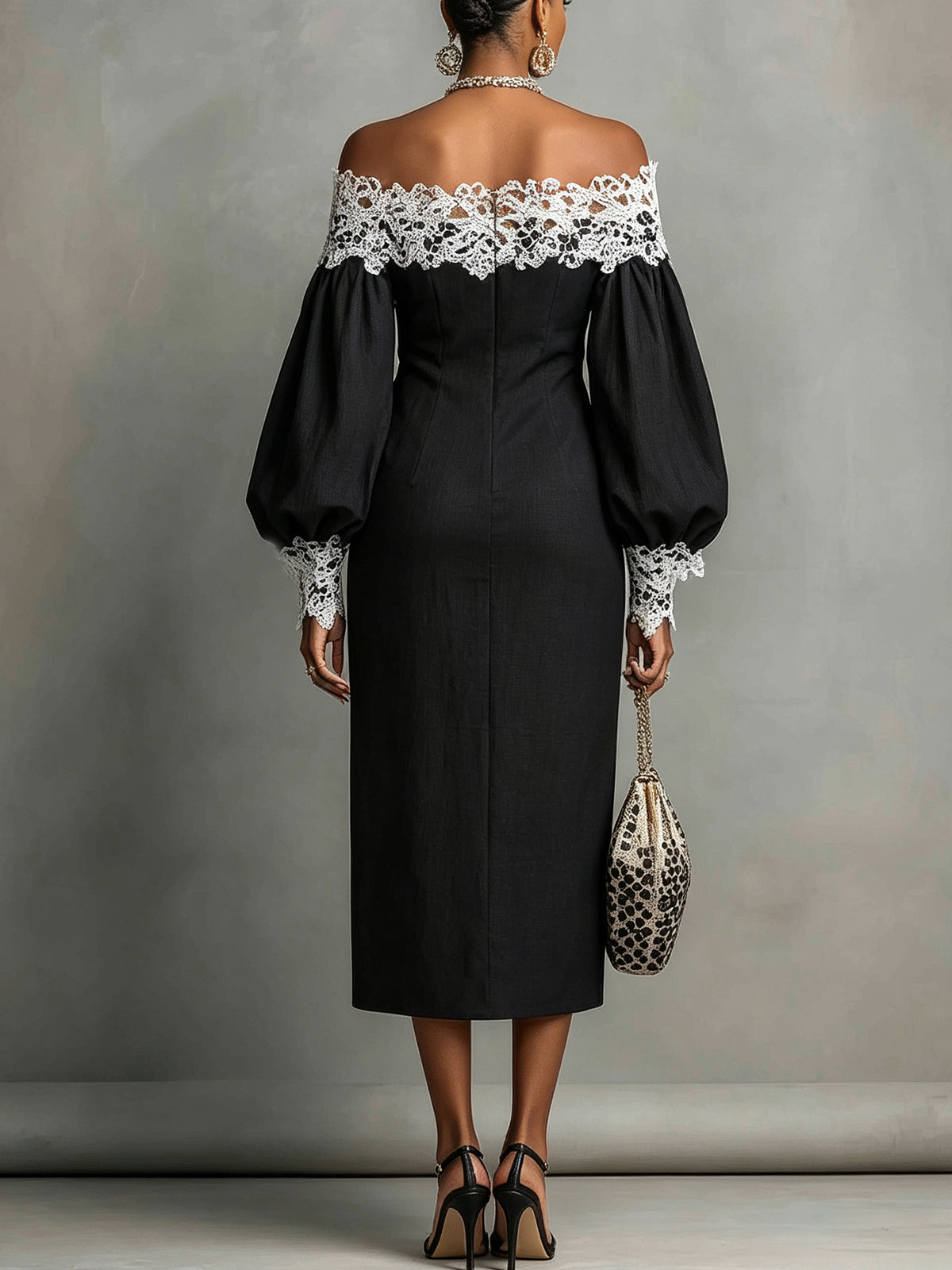 Abito midi nero off-the-shoulder con rifiniture in pizzo a contrasto