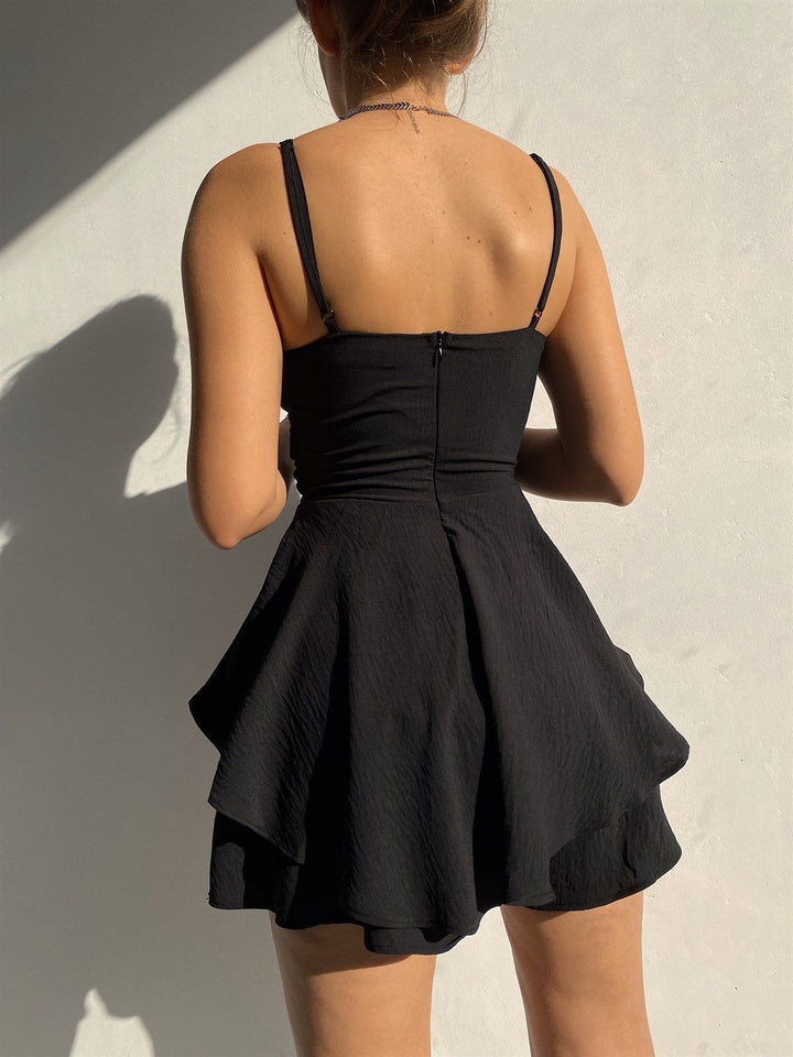 Tuta alla Moda in Colore Unito con Zip e Spalline Sottile