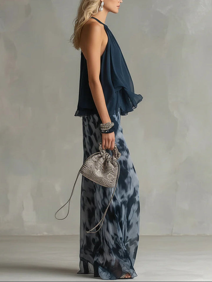 Top con Collo Halter Blu Navy e Pantaloni a Gamba Larga Stampati in Chiffon