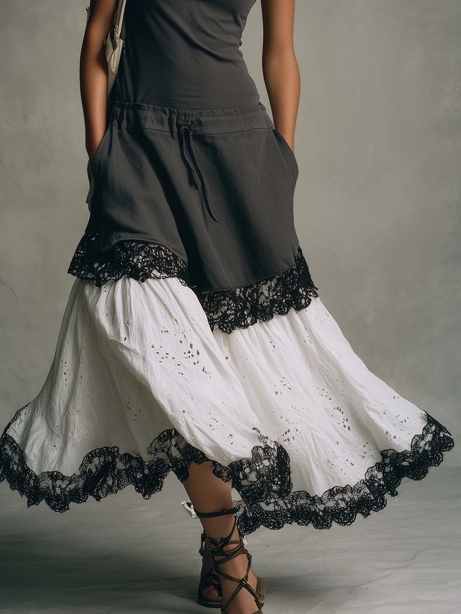Abito maxi bohemien senza maniche con vita bassa e inserti in pizzo