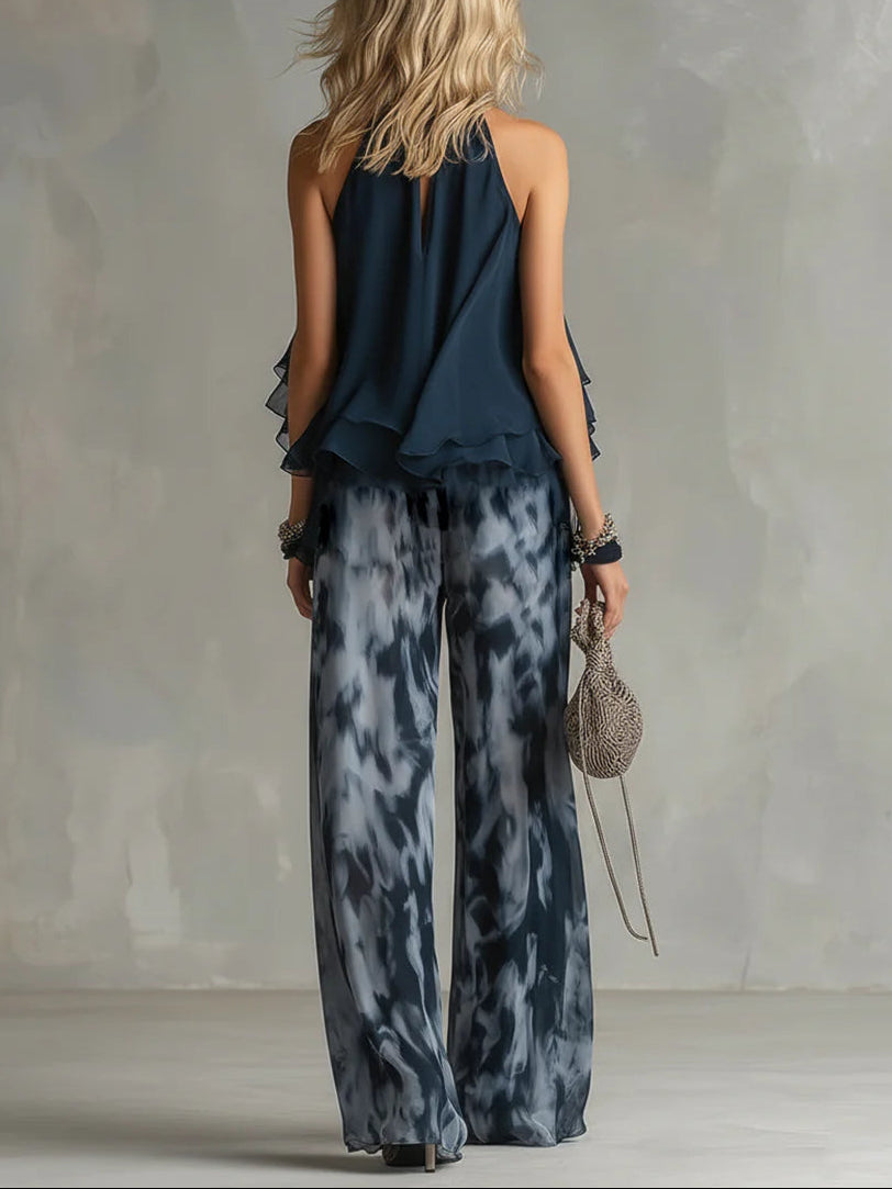 Top con Scollo Halter Navy e Pantaloni Ampi Stampati in Chiffon