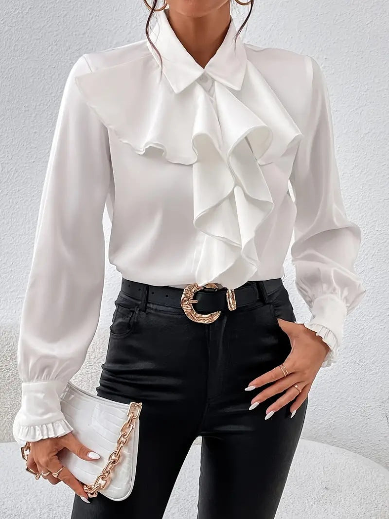 Camicia elegante con dettagli di design arricciati e a strati.