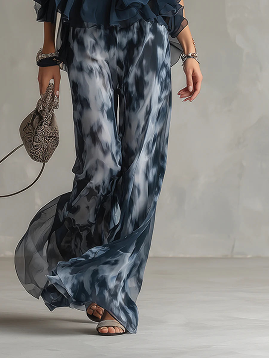 Top con Scollo Halter Navy e Pantaloni Ampi Stampati in Chiffon