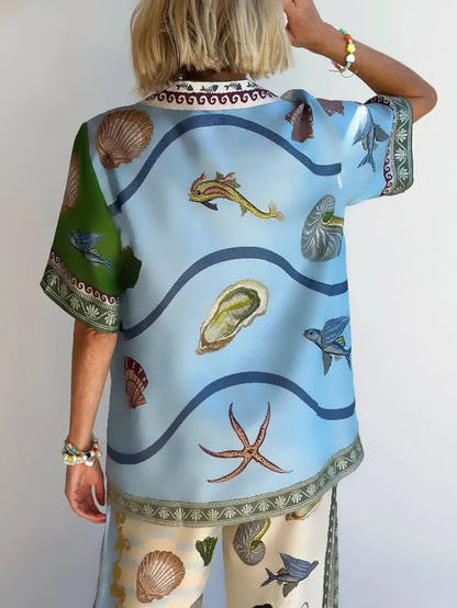 Set di Camicia e Pantaloni Larghi con Stampa Floreale Unica del Profondo Mare