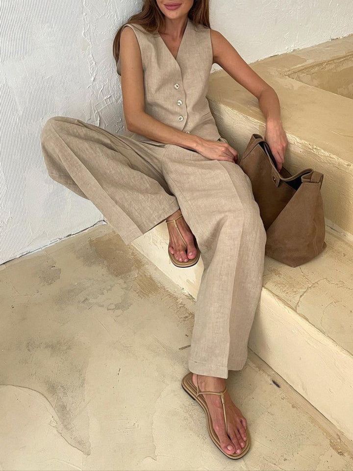 Pantaloni a gamba larga in cotone e lino plissettati con scollo a V