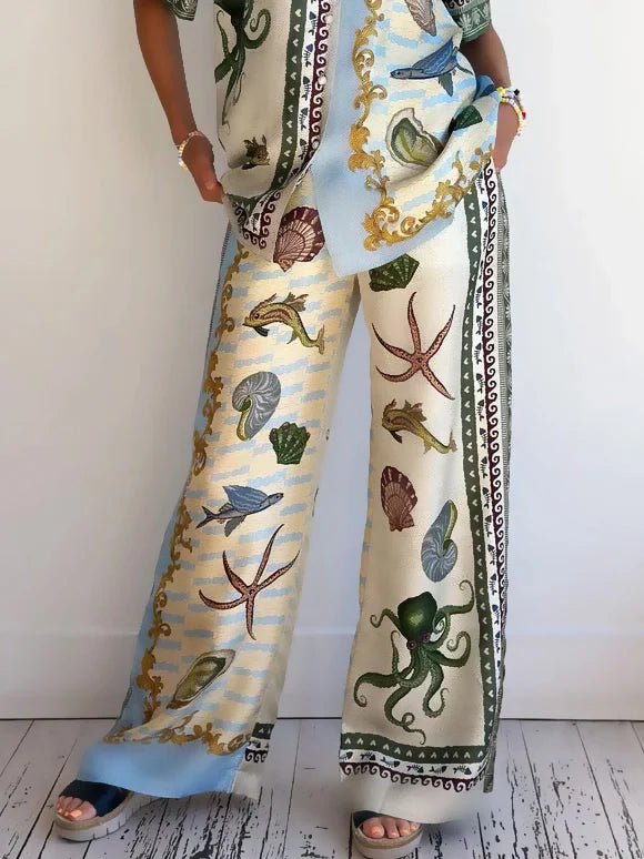 Set di Camicia e Pantaloni Larghi con Stampa Floreale del Profondo Mare