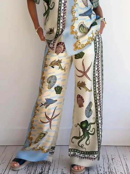 Set di Camicia e Pantaloni Larghi con Stampa Floreale Unica del Profondo Mare
