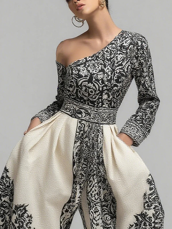 Salopette Harem Vintage Floreale Nero e Bianco con Spalla Scoperta e Tasche