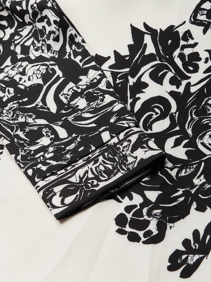 Salopette Harem Vintage Floreale Nero e Bianco con Spalla Scoperta e Tasche