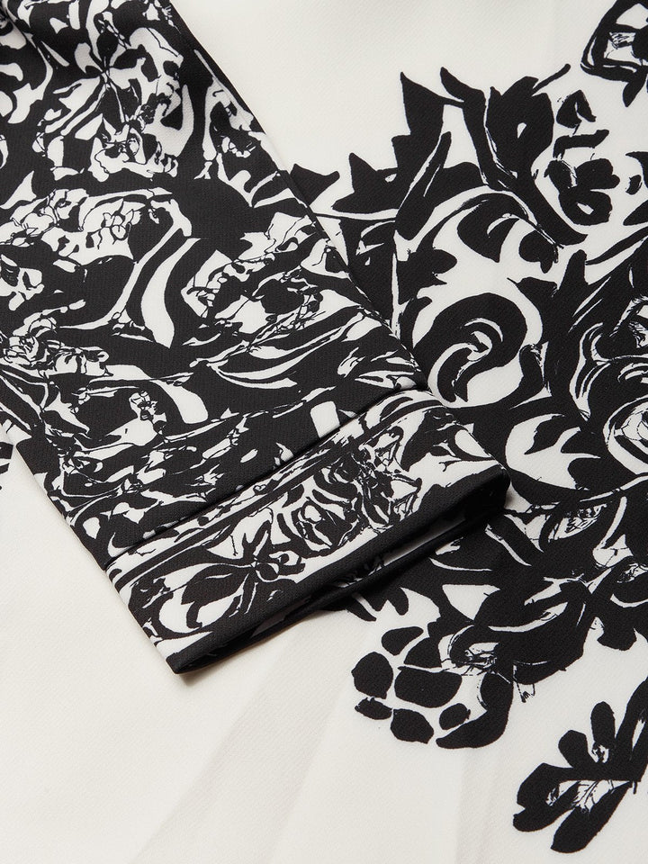 Salopette Harem Vintage Floreale Nero e Bianco con Spalla Scoperta e Tasche