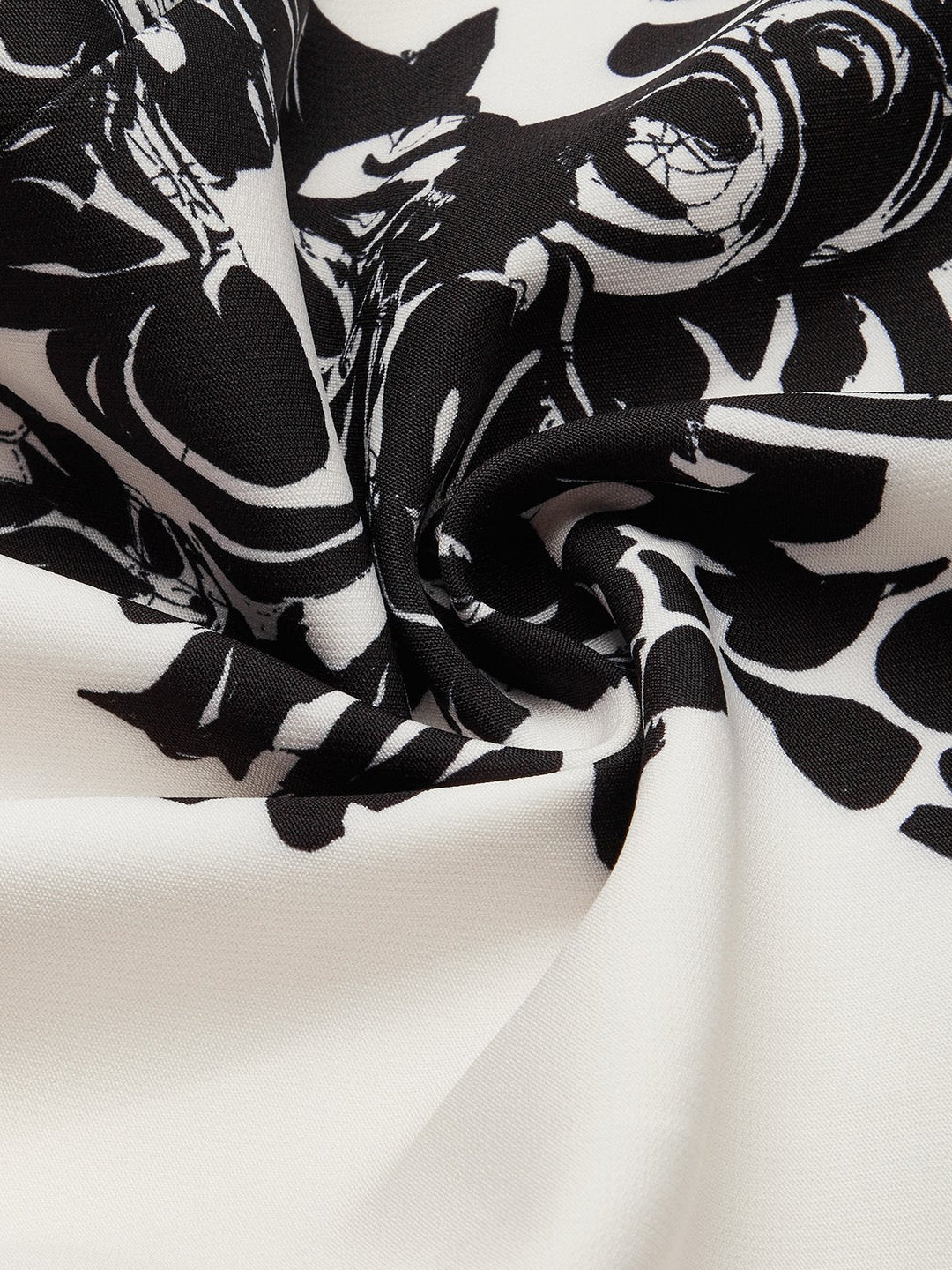 Salopette Harem Vintage Floreale Nero e Bianco con Spalla Scoperta e Tasche