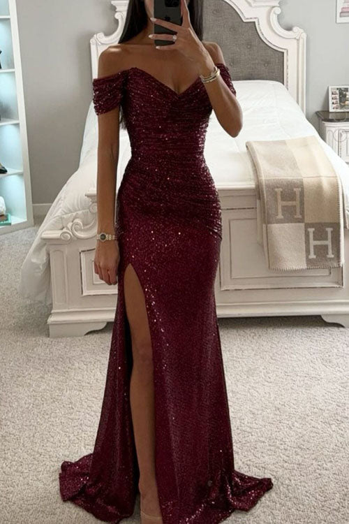 Abito da festa con paillettes, spalline scoperte e spacco