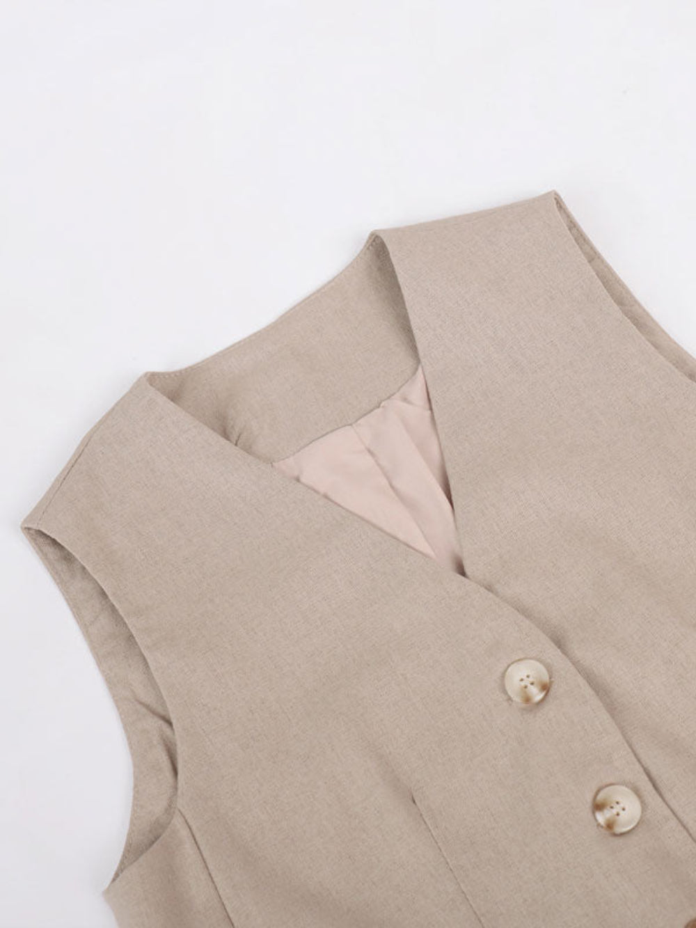 Pantaloni a gamba larga in cotone e lino plissettati con scollo a V