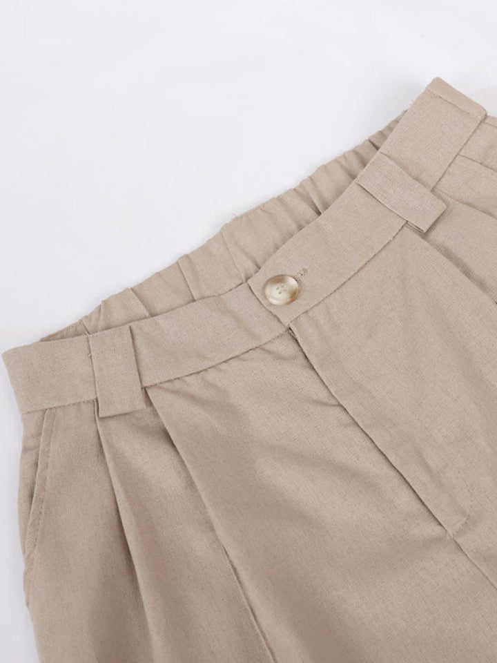 Pantaloni a gamba larga plissettati in cotone e lino con scollo a V classico