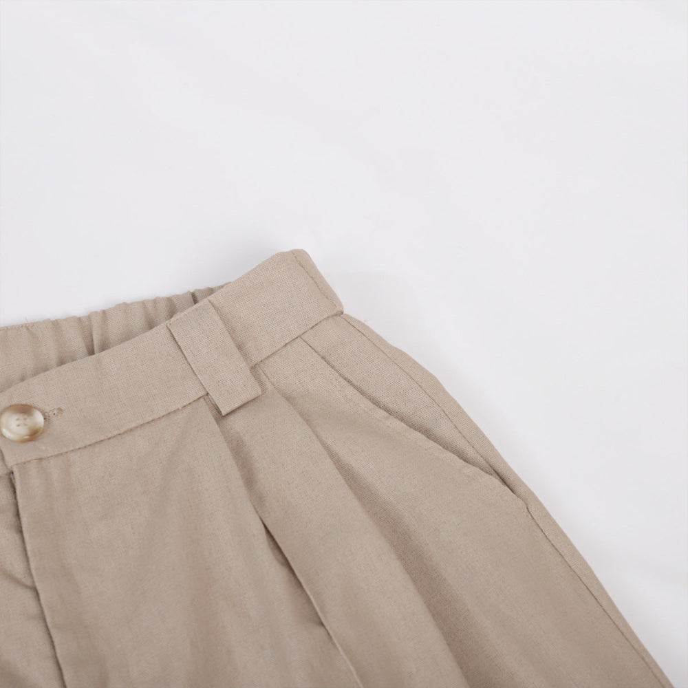 Pantaloni a gamba larga in cotone e lino plissettati con scollo a V