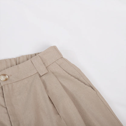 Pantaloni a gamba larga in cotone e lino plissettati con scollo a V