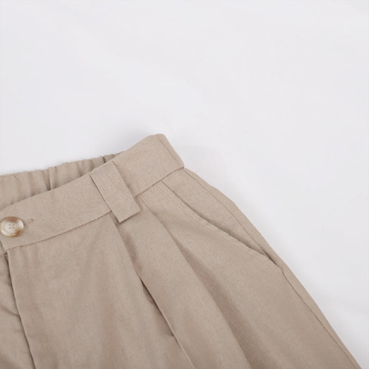 Pantaloni a gamba larga in cotone e lino plissettati con scollo a V