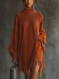 Vestito arancione in corduroy con orlo a frange e colletto alto