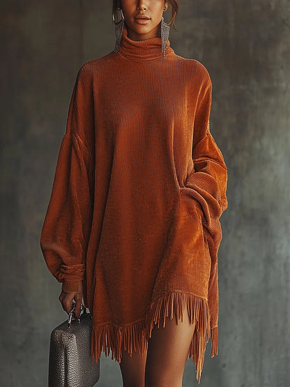 Abito arancione in corduroy con orlo a frange e colletto alto