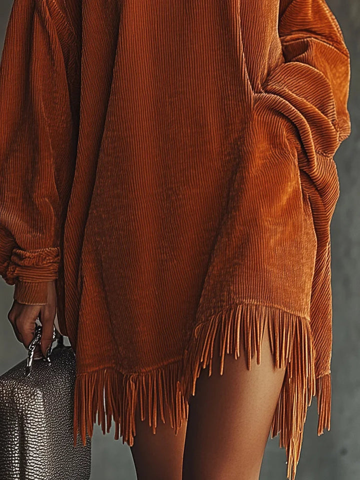Vestito arancione in corduroy con orlo a frange e colletto alto