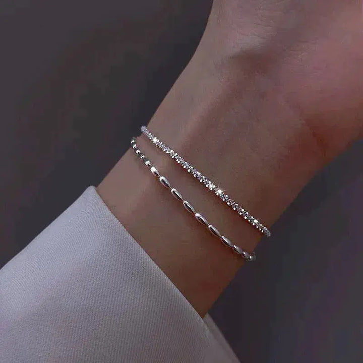 Set di bracciali eleganti in argento con pietre di zirconio