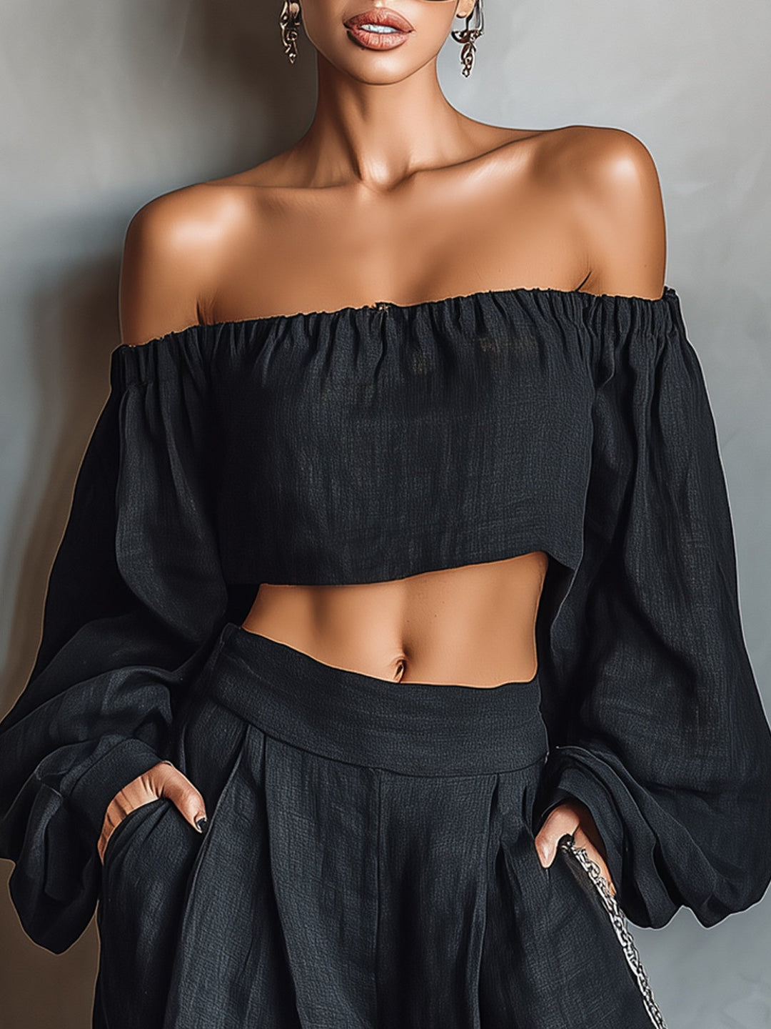 Set Top Lungo a Spalle Scoperte e Pantaloni a Gamba Larga Neri