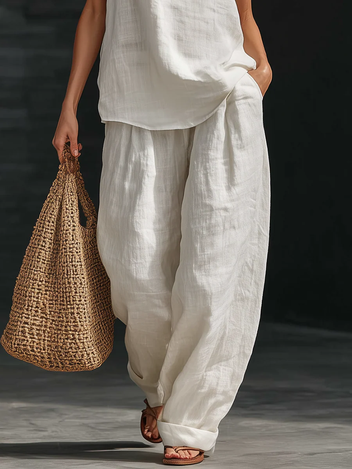 Set Top Senza Maniche V-collo in Lino Finto Bianco e Pantaloni a Gamba Larga