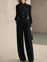 Blusa con Papillon a Righe Bianche e Nere e Pantaloni a Gamba Larga Set di Due Pezzi