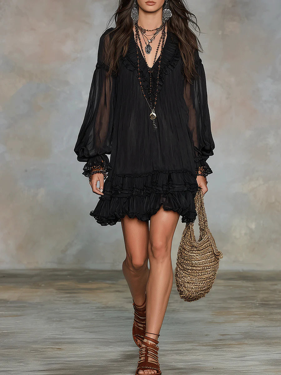 Abito mini in chiffon nero con maniche a lanterna e volant