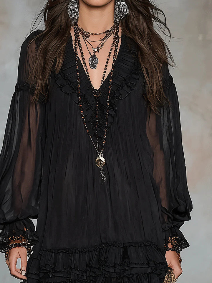 Abito mini in chiffon nero con maniche a lanterna e volant
