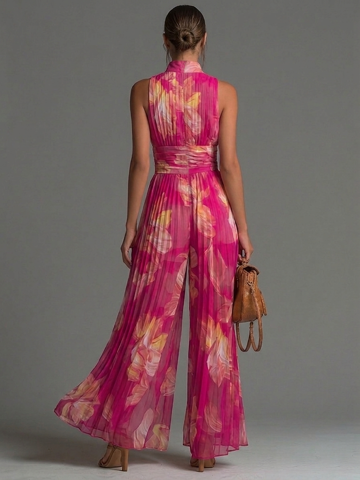 Tuta senza maniche in chiffon a pieghe con zip e stampa floreale fucsia