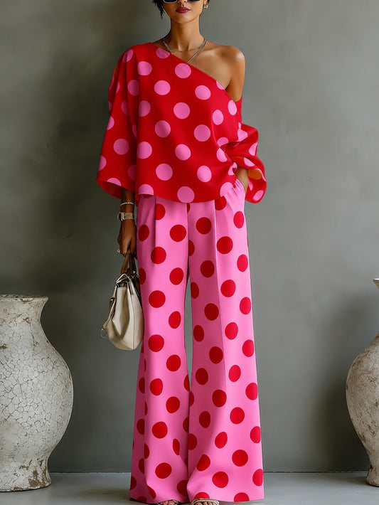 Set due pezzi con top off-shoulder a pois rosa retro e pantaloni a gamba larga