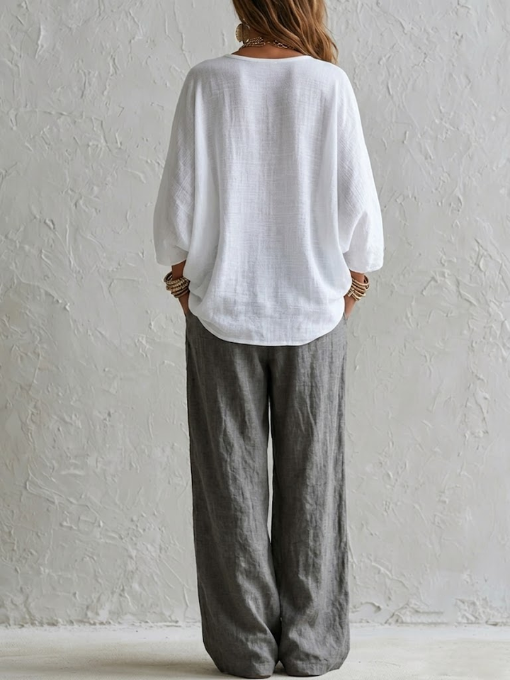 Completo Top Bianco Lungo e Pantaloni Grigi a Vita Alta a Gamba Larga