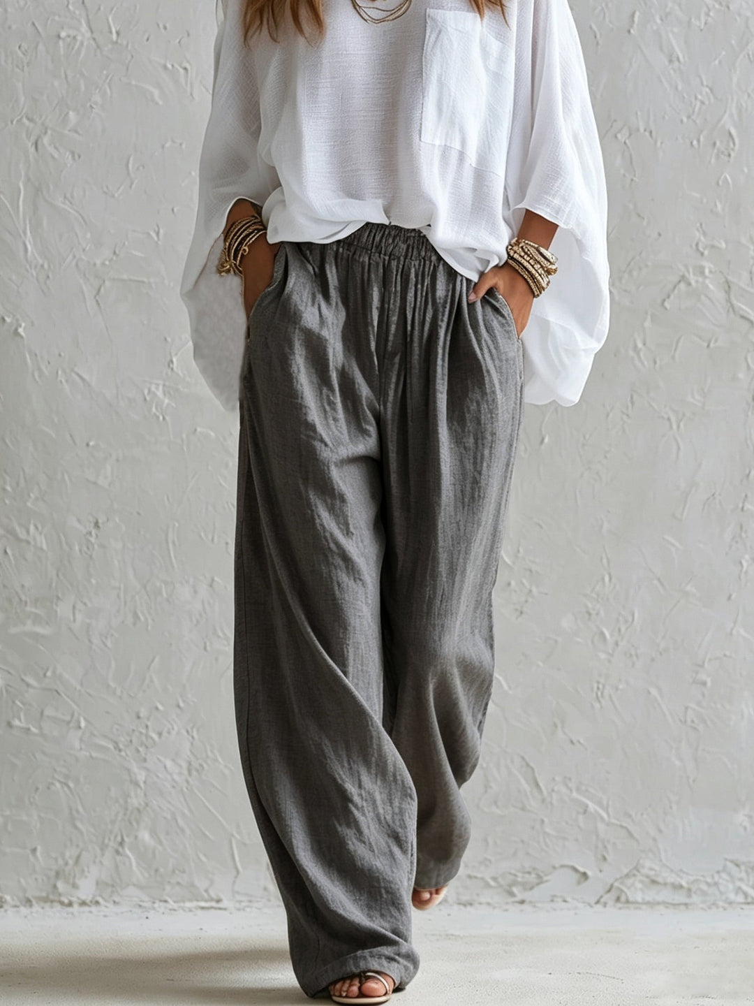 Completo Top Bianco Lungo e Pantaloni Grigi a Vita Alta a Gamba Larga