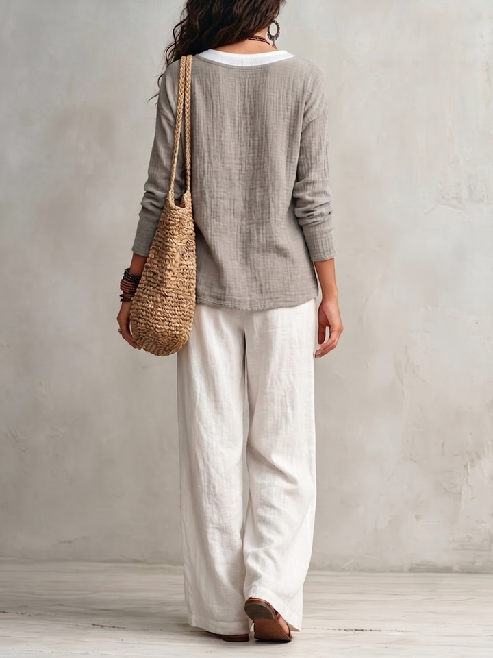 Top Grigio a V Finto a Strati e Pantaloni Larghi Bianchi con Vita Elasticizzata