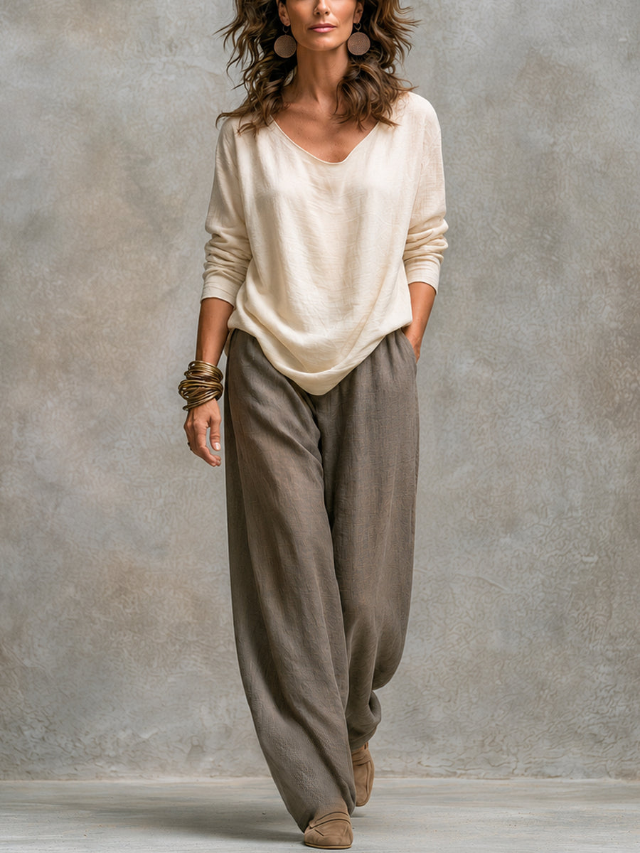Completo Elegante a Tre Pezzi con Pantaloni a Gamba Larga in Grigio Beige