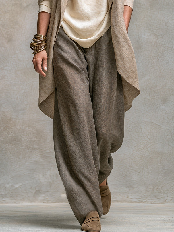 Completo Elegante a Tre Pezzi con Pantaloni a Gamba Larga in Grigio Beige