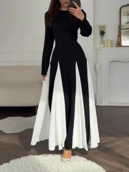 Abito Elegante Nero e Bianco con Collo Rotondo e Maniche Lunghe