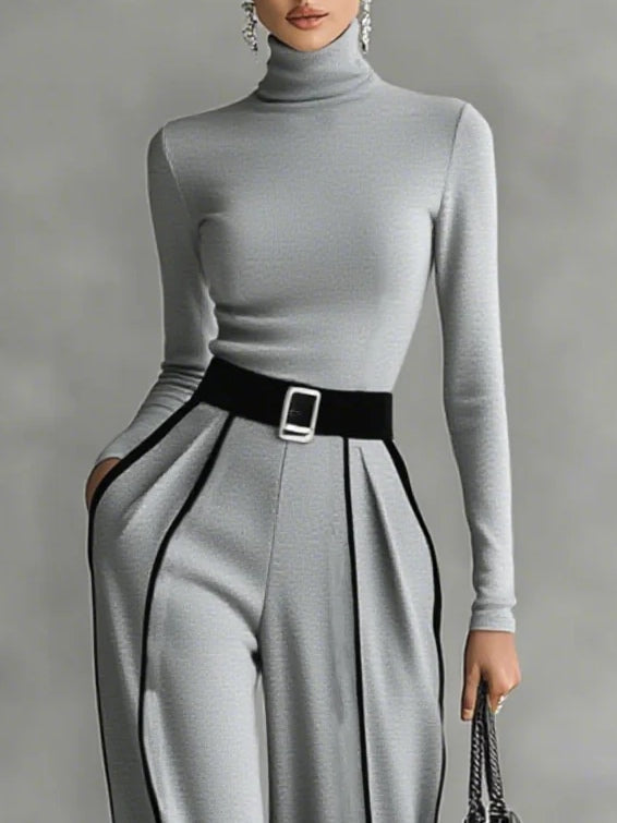 Set di top a maniche lunghe con collo alto e bordi bianchi e pantaloni a gamba larga con cintura