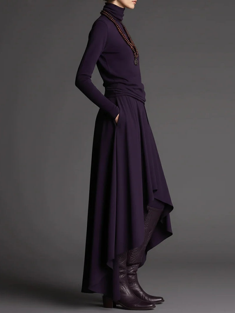 Set di due pezzi con maglione a collo alto viola e gonna asimmetrica